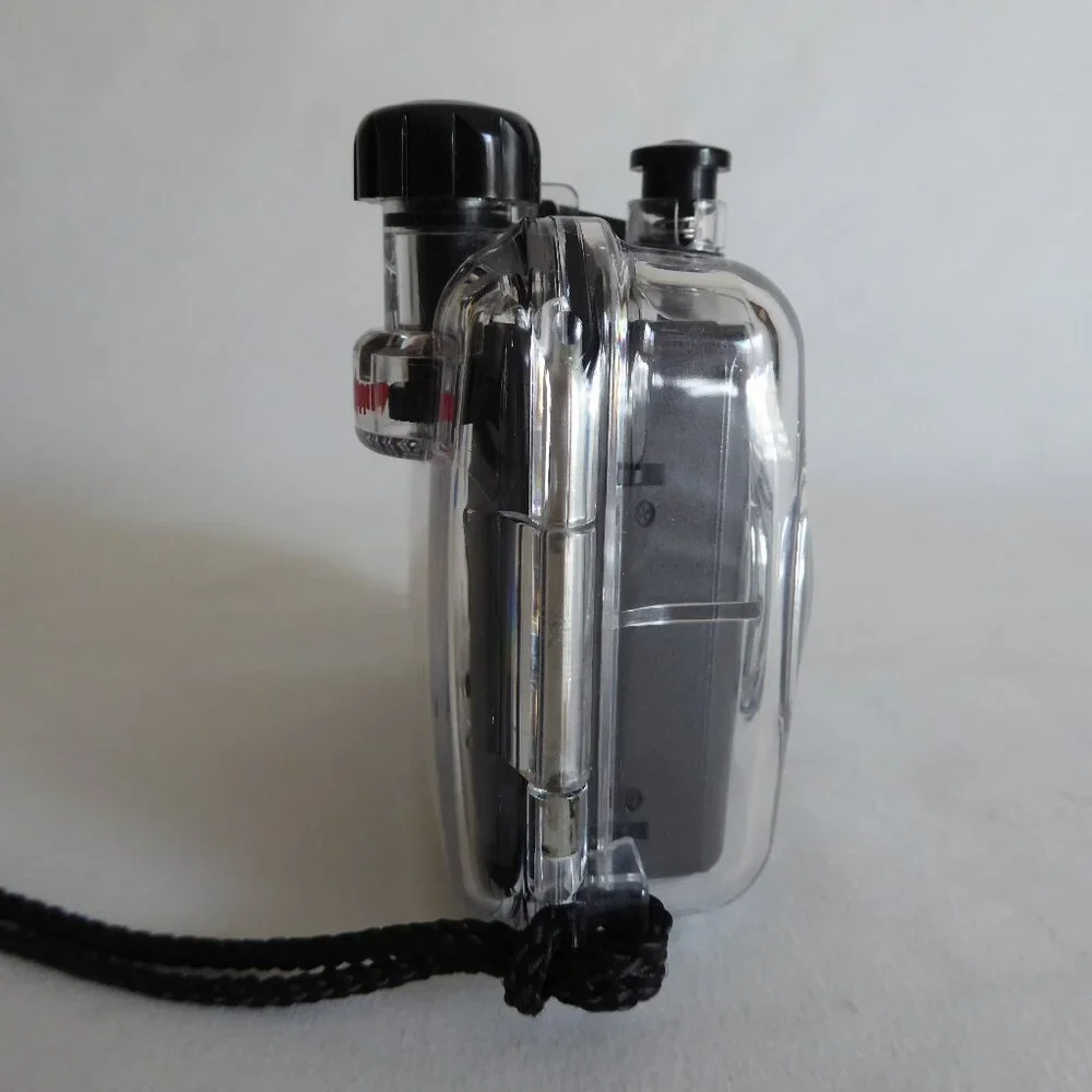 USED ONCE WATERPROOF SPORT UTILITY COMPACT 35mm CAMERA IN CASING